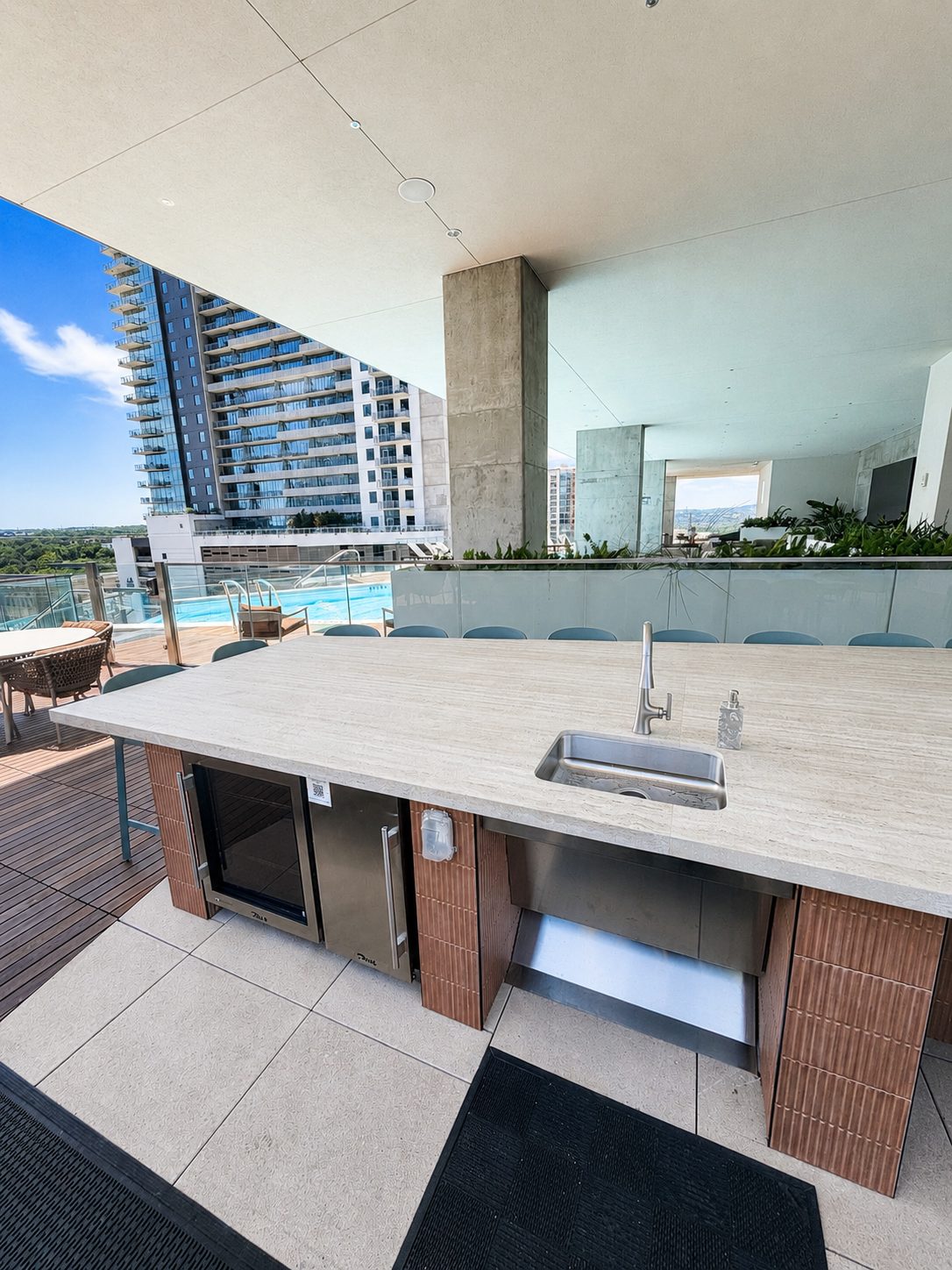 The Independent rooftop outdoor kitchen — downtown Austin view