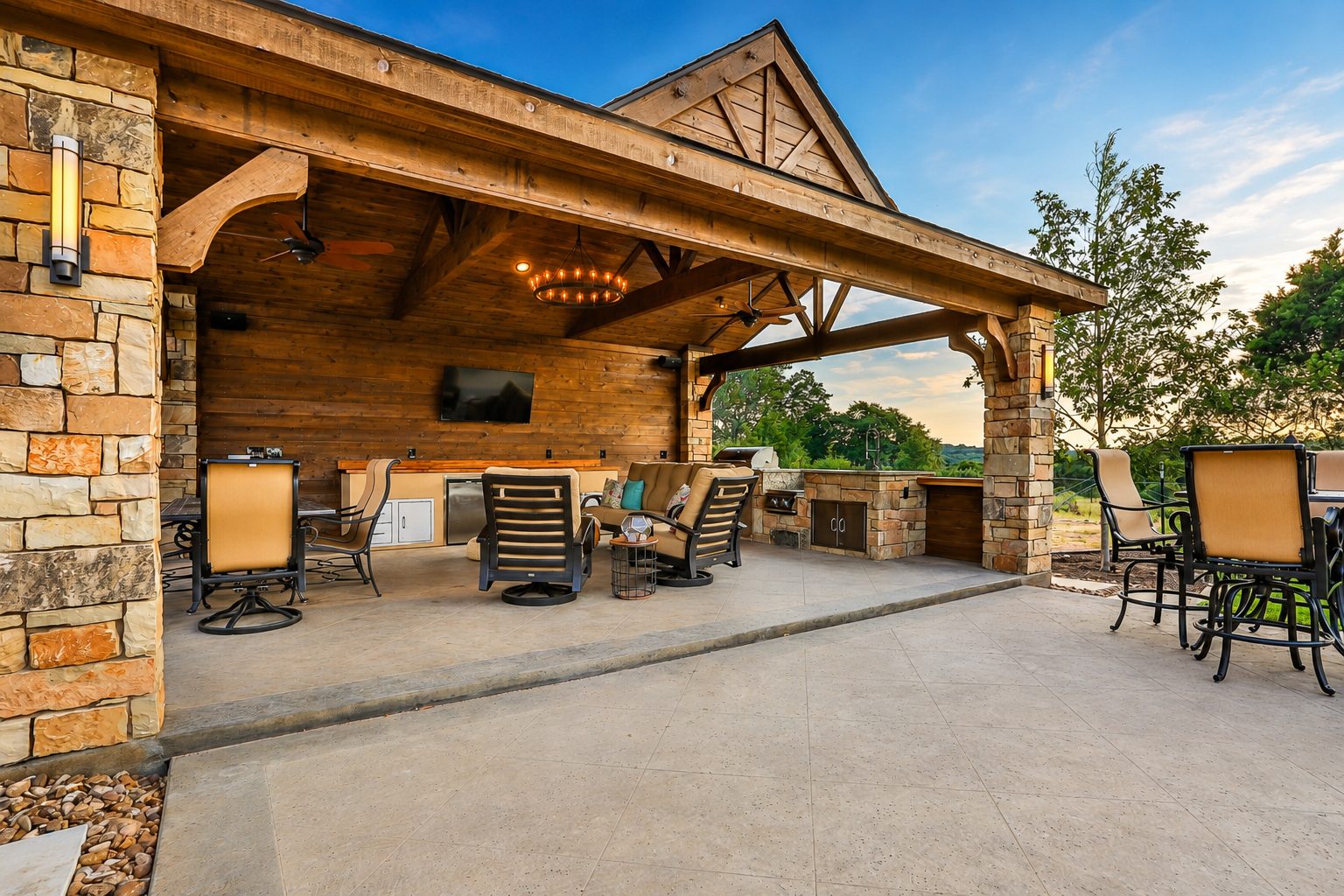 HWY 290 dry-stack stone fire pit with Adirondack chairs