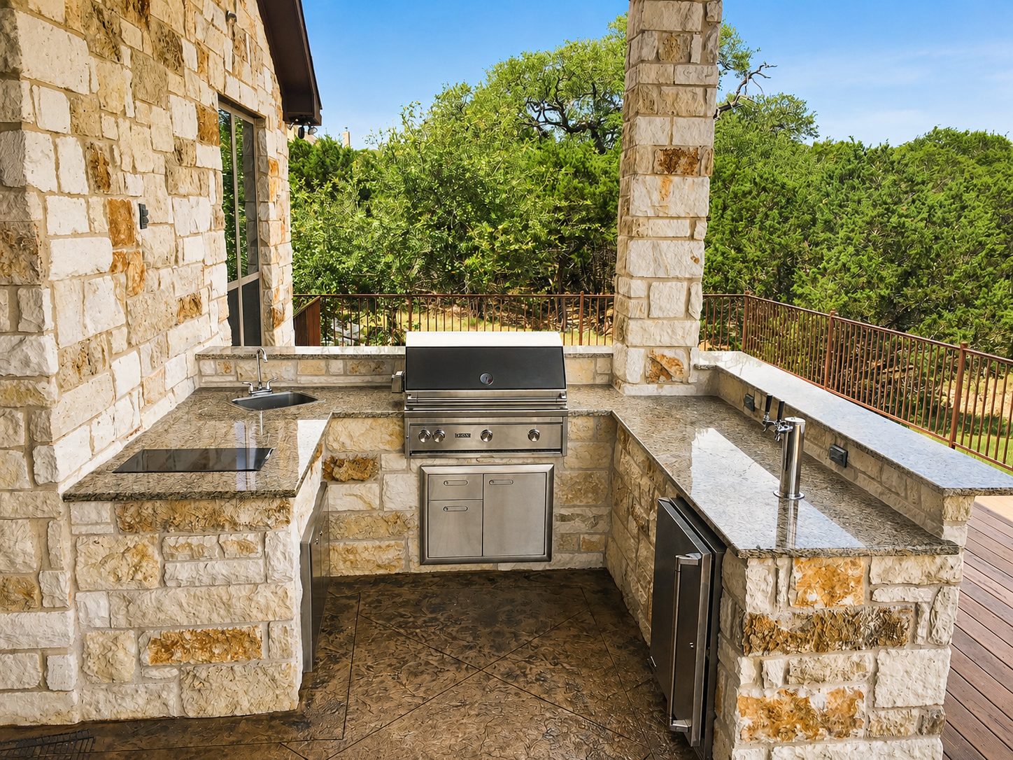 Custom limestone masonry outdoor kitchen built by 4 Season's Outdoors
